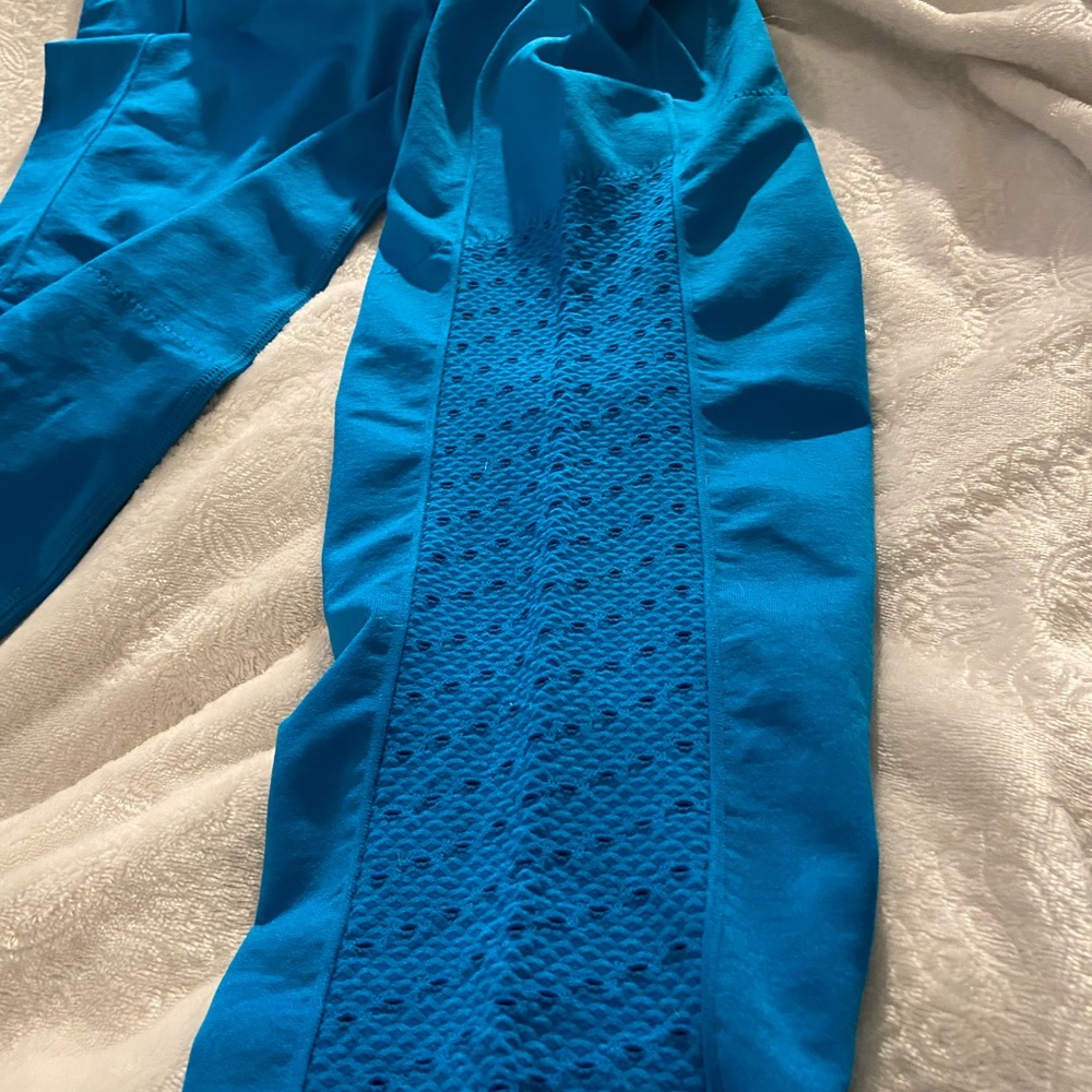 FABLETICS high waisted leggis with adorable design on side of legs.